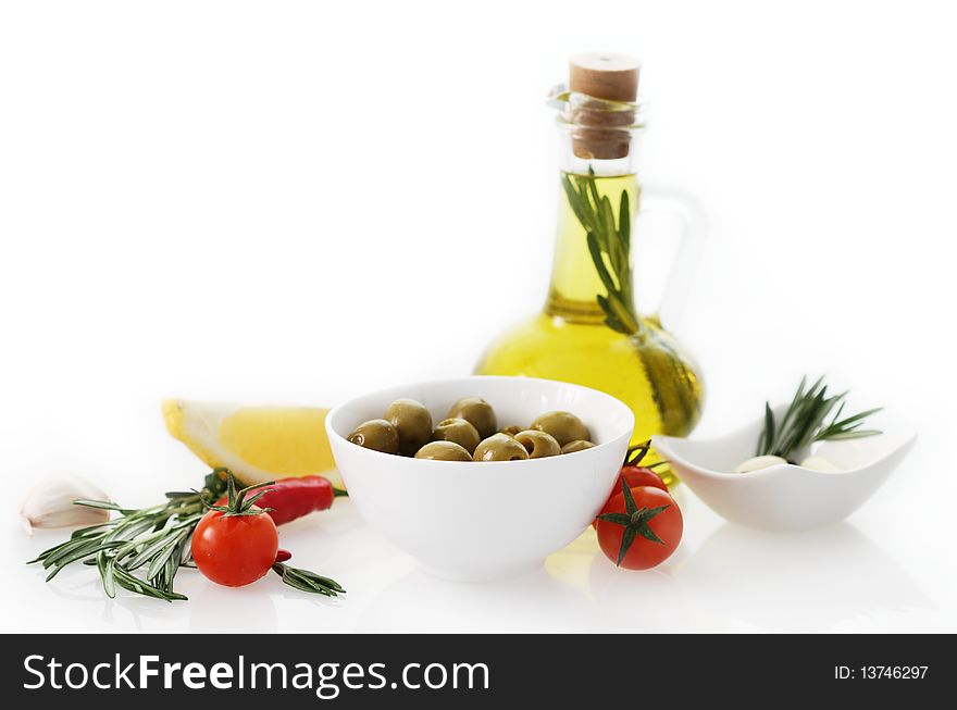 Vegetables still life with olive oil