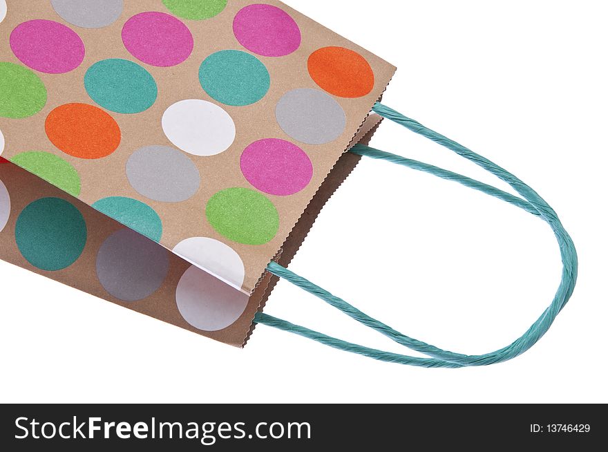 Paper gift bag isolated on white with a clipping path.