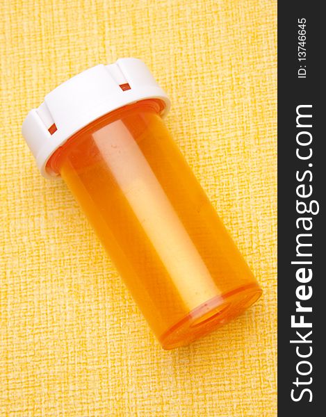 Prescription Bottle On Yellow