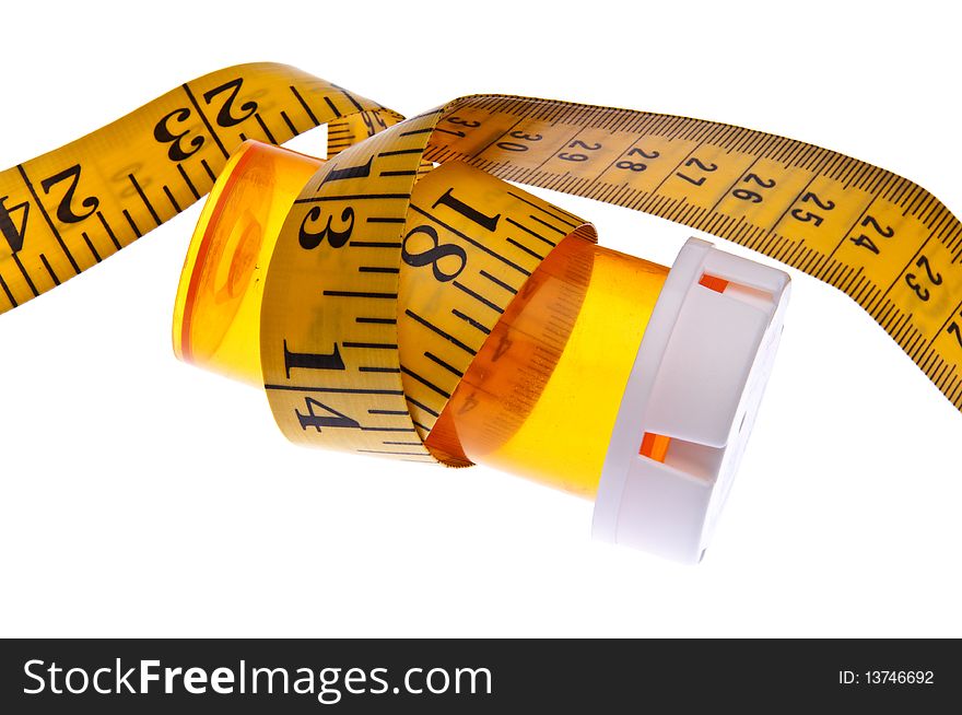 Prescription bottle with a measuring tape suggests a weight loss theme.  Isolated on white with a clipping path. Prescription bottle with a measuring tape suggests a weight loss theme.  Isolated on white with a clipping path.