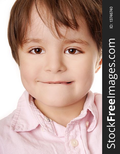 Portrait of ittle cute smiling boy in pink shirt on white background. Portrait of ittle cute smiling boy in pink shirt on white background