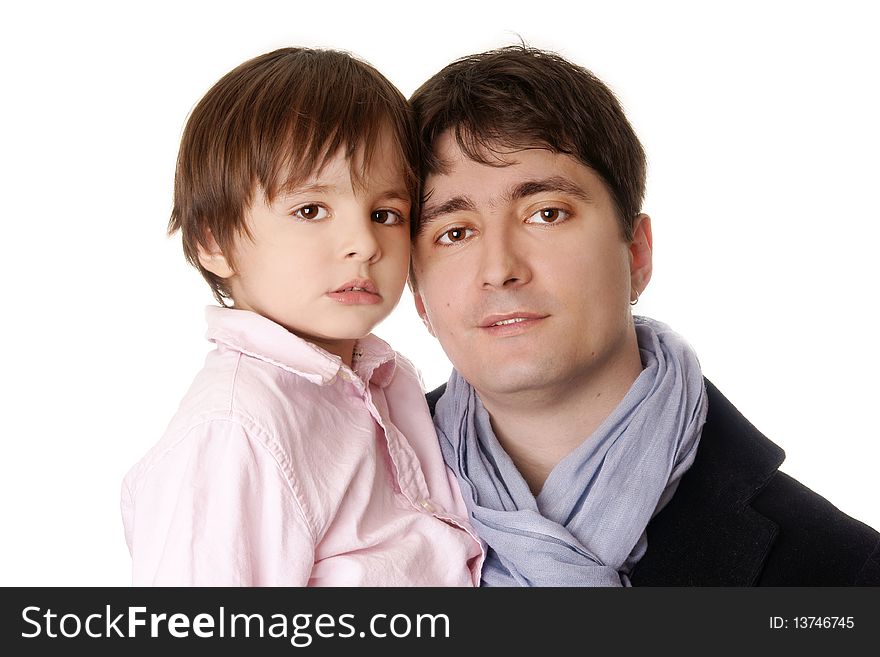 Cute little boy with young attractive father on white background. Cute little boy with young attractive father on white background