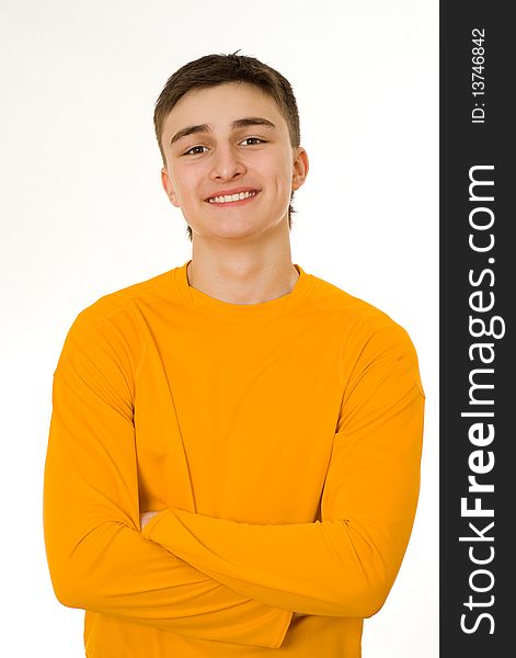 Beautiful young man standing on a white