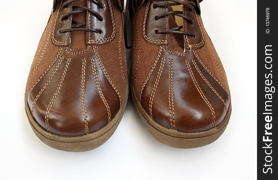 Front of a pair of brown shoes isolated. Front of a pair of brown shoes isolated