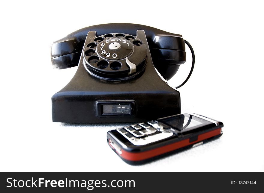 Black retro telephone on white