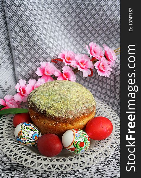 Traditional othodox easter pie with eggs on a ornamental cloth. Traditional othodox easter pie with eggs on a ornamental cloth