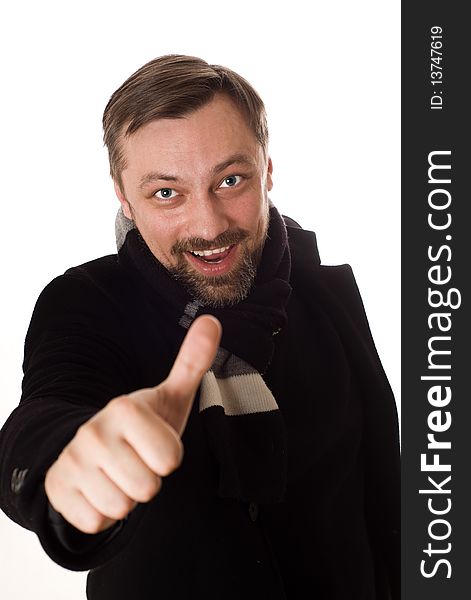 Happy man in a black coat with a white background