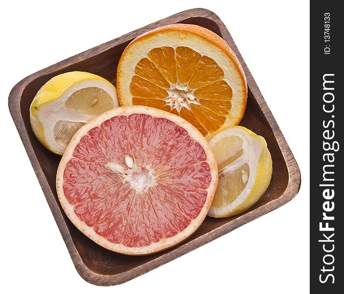 Bowl of Sliced Citrus isolated on white with a clipping path.
