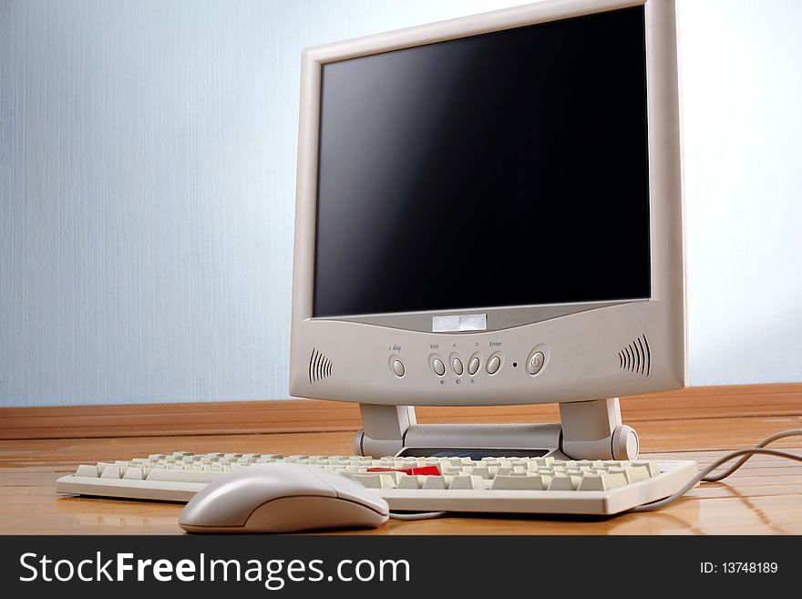 Keyboard and monitor at table