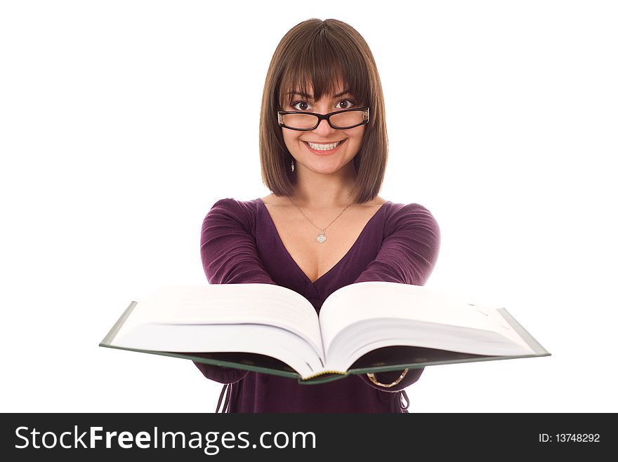 Young pretty girl standing with a book on white. Young pretty girl standing with a book on white