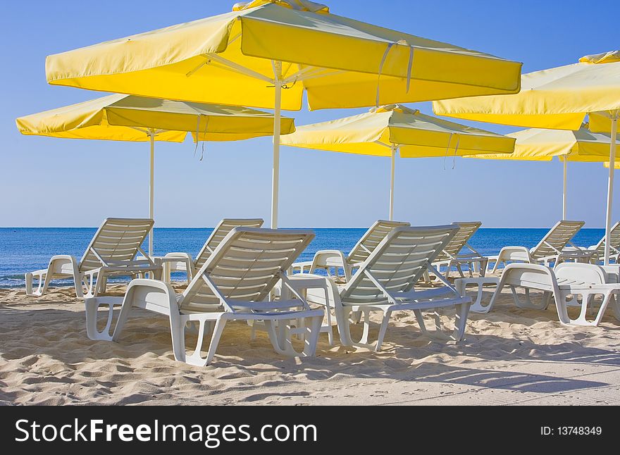 View of chairs and umbrellas on the beach