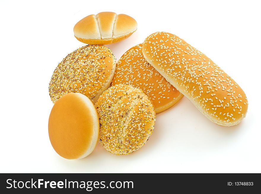 Appetizing buns with sesame on white background with shadow. Appetizing buns with sesame on white background with shadow