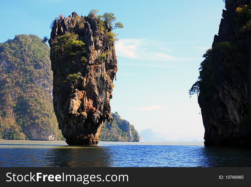 This is a famous mountain in Phangnga bay. Thai people call Khao Tapoo.
