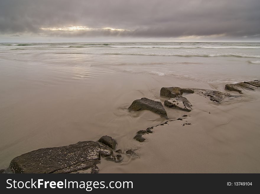 Rocky Beach With Dramatic Sky