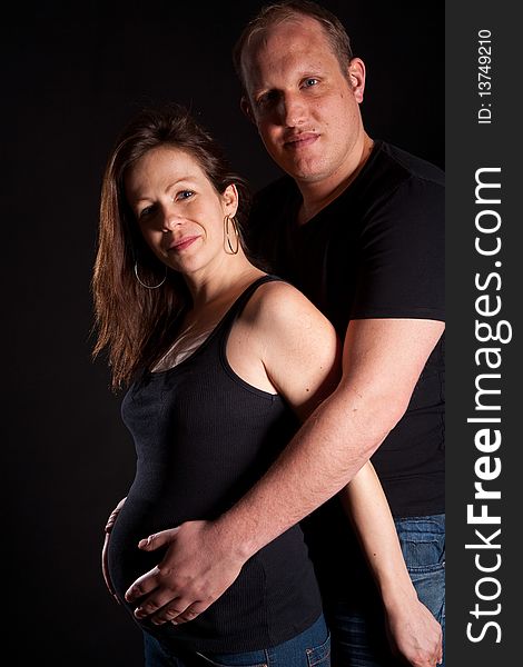 Young Couple With Pregnant Wife