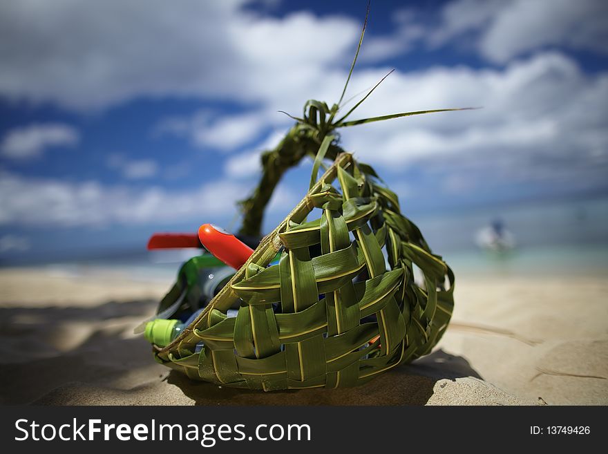 Handmade leaf basket on the beach. Handmade leaf basket on the beach