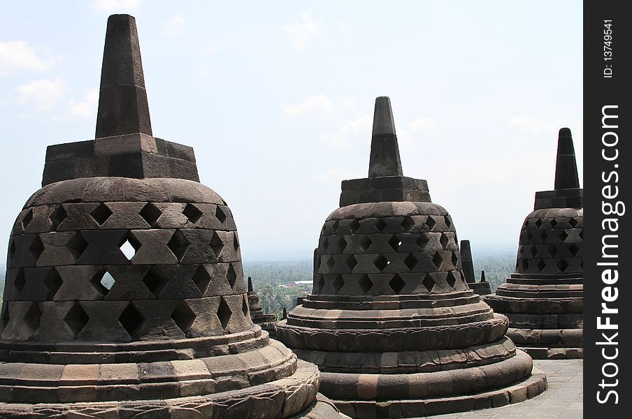 View of a few stupas on top of the Borobudur temple in central Indonesia. View of a few stupas on top of the Borobudur temple in central Indonesia