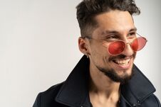 Close Up Portrait Of Smiling Handsome Man In Sunglasses In Black Jacket Royalty Free Stock Photography