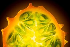 Kiwano Or Horned Melon Cucumis Metuliferus Sliced In A Half On Black Background Royalty Free Stock Photo