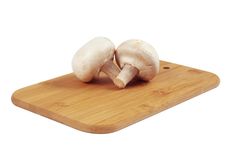Mushrooms On A Wooden Board. Royalty Free Stock Photo Mushrooms On A Wooden Board. Royalty Free Stock Photo