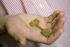 House Key In Palm Stock Photo