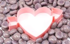 Heart With Arrow Surroundedy By Purple Rocks Royalty Free Stock Photos Heart With Arrow Surroundedy By Purple Rocks Royalty Free Stock Photos