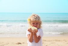 Little Girl With Seashell Stock Image