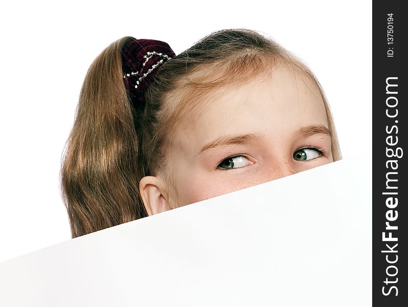 Girl peeping out of card isolated on white. Girl peeping out of card isolated on white