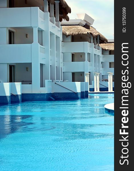 Luxury hotel and outdoor pool in exotic location. Luxury hotel and outdoor pool in exotic location