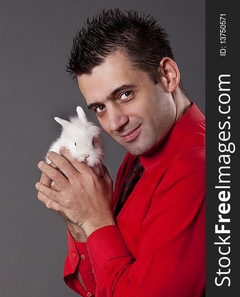 Handsome Young Man Holding White Rabbit