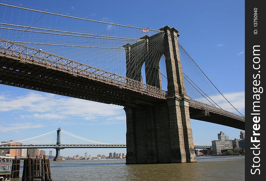 Brooklyn and Manhattan Bridges as seen from the Manhattan side of the East River. Brooklyn and Manhattan Bridges as seen from the Manhattan side of the East River.