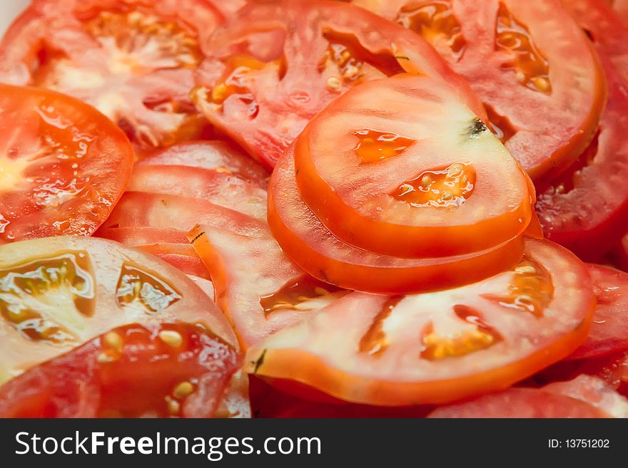 Many Red Circles Of Fresh Tomatos