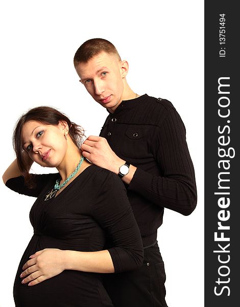 Beautiful smiling pregnant woman and a happy man. Beautiful smiling pregnant woman and a happy man