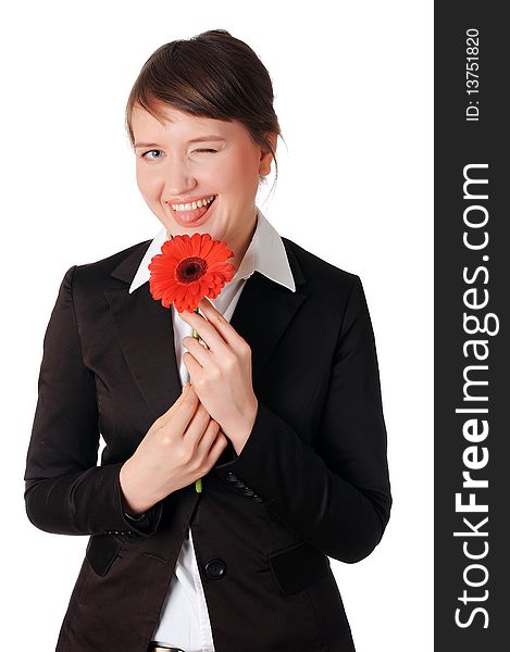 Charming young business woman playing with a red flower