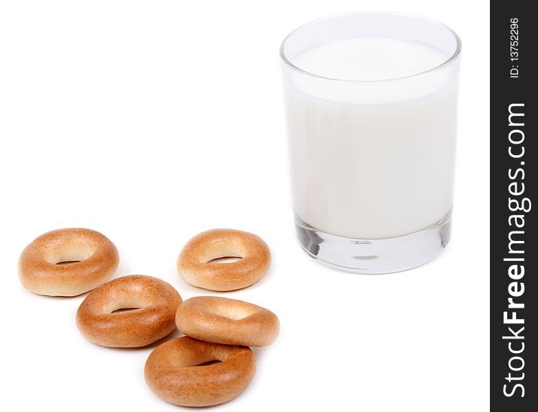 Glass milk bagels insulated on white background