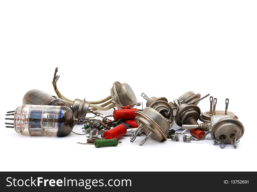 Old radio components on white background