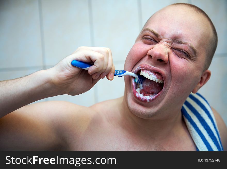 Man brushing his teeth