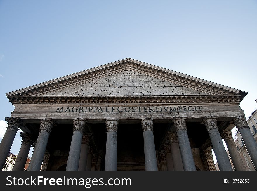 Frontal view of Pantheon in Rome over blue sky. Frontal view of Pantheon in Rome over blue sky