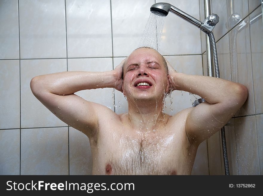 Man Enjoys The Washing In The Shower
