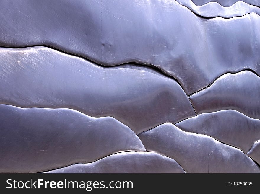 A series of polished Aluminum panels on the side of the portland waste reclamation plant. A series of polished Aluminum panels on the side of the portland waste reclamation plant