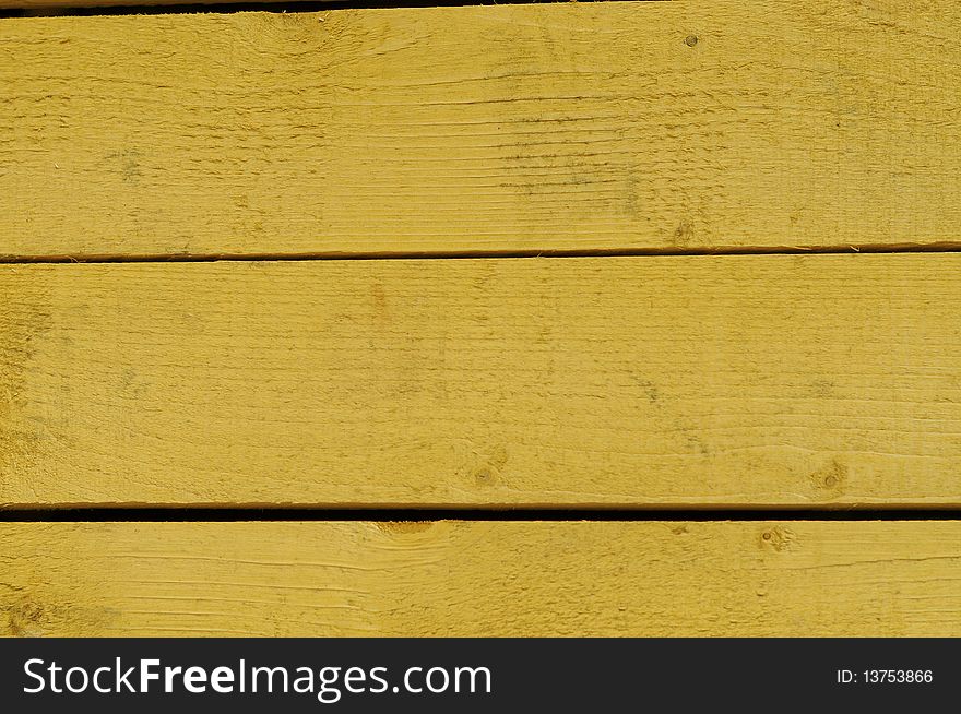A yellow wood texture from a fence