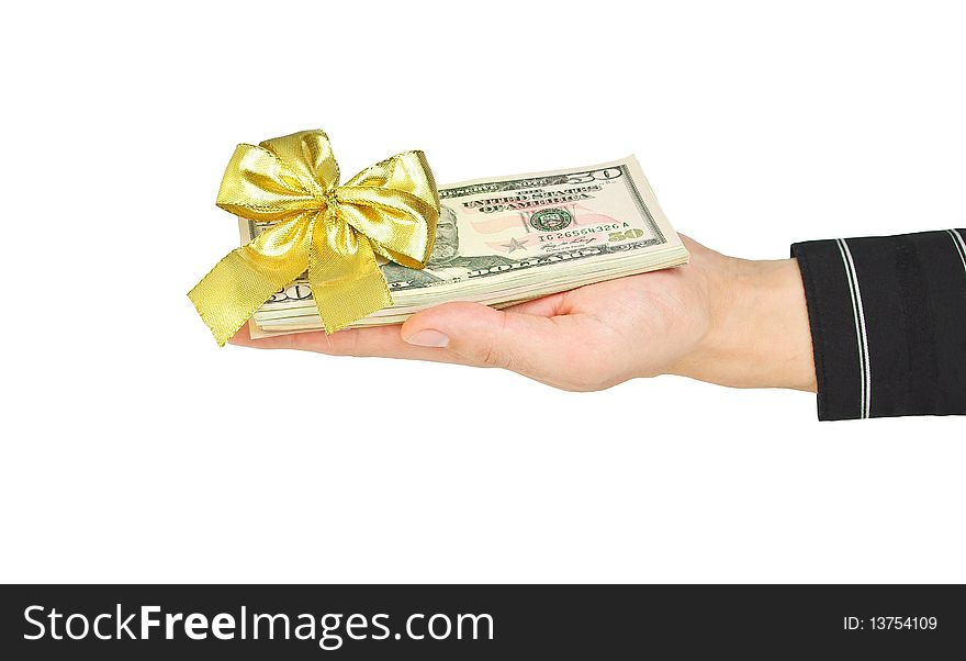 Dollars with bow on hand isolated on white. Dollars with bow on hand isolated on white