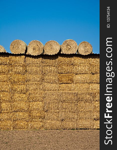 Bale of straw with blue sky