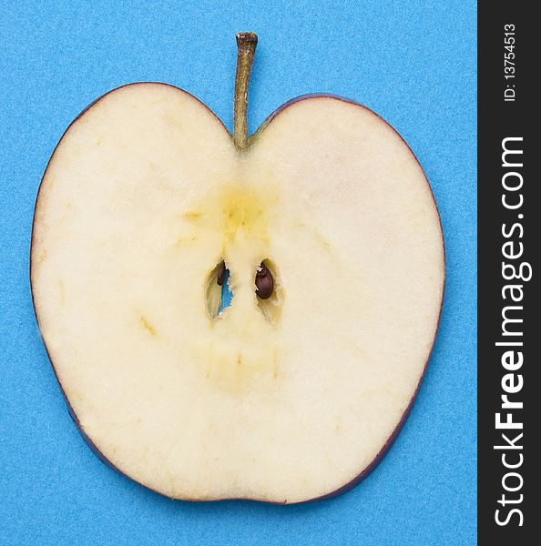 Apple Slice on a Vibrant Background with seeds.