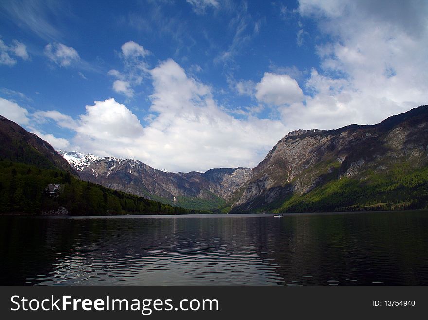 Lake Bohinj, Slovenia, reflection of a sunset. Lake Bohinj, Slovenia, reflection of a sunset