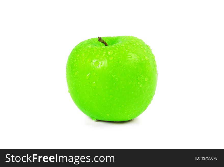 Wet green apple with water spray isolated on white