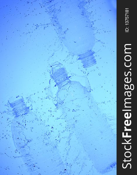 Background with Plastic bottle in blue water. Background with Plastic bottle in blue water