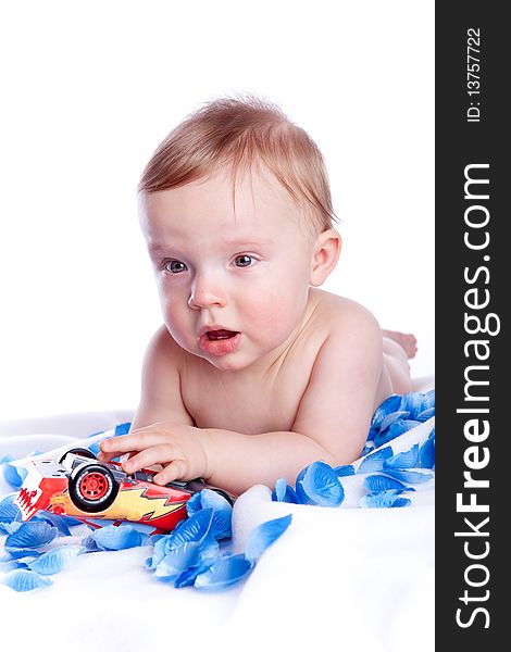 Baby Boy Playing With Red Car