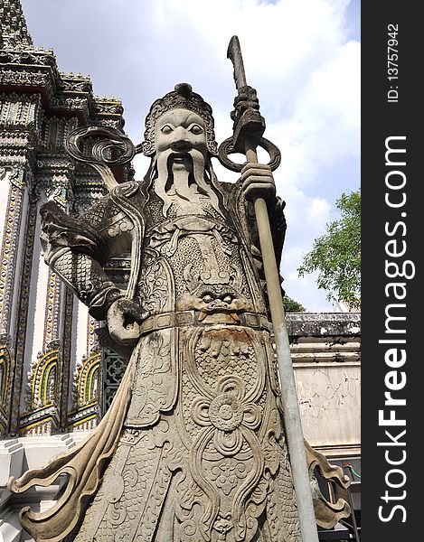 A stone statue Guan Yu Chinese art. Taken at a temple. A stone statue Guan Yu Chinese art. Taken at a temple.