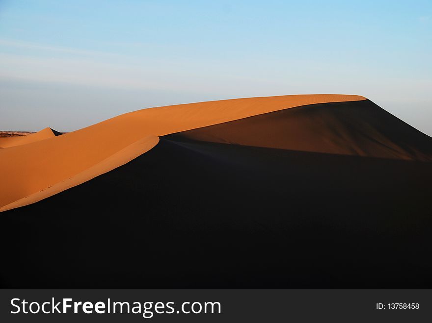 Graceful curves create a breathtaking spectacle of the desert. Graceful curves create a breathtaking spectacle of the desert